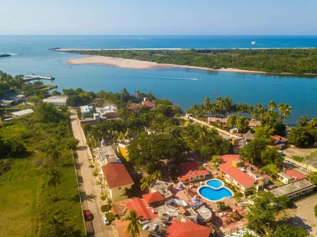 Hotel Garza Canela guest area with tropical landscaping near San Blas