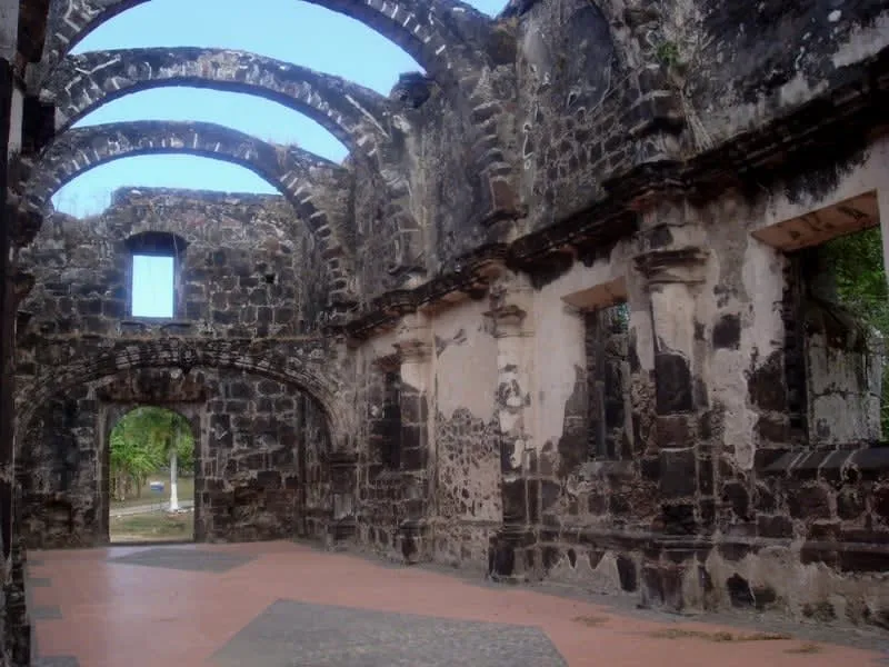 Stone walls of La Marinera church beneath open sky in San Blas