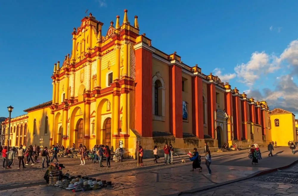Yellow colonial cathedral facade beside the main plaza
