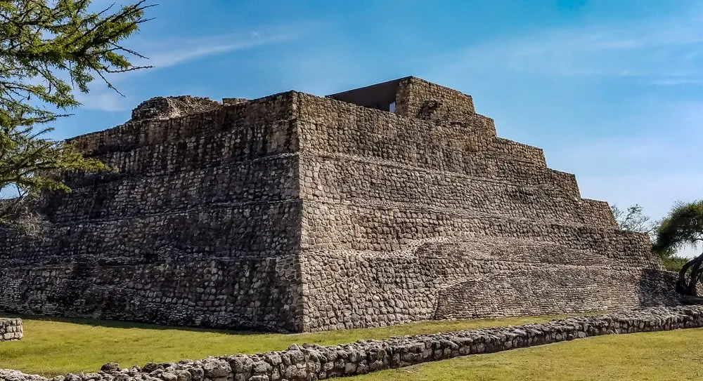 San Miguel de Allende UNESCO historic center rooftops and colonial architecture with mountains in the background at golden hour
