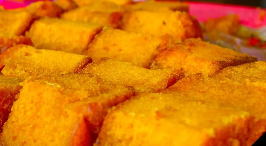 Golden crispy chimbos from Chiapas — small baked buns soaked in egg, fried, and drizzled with honey and cinnamon