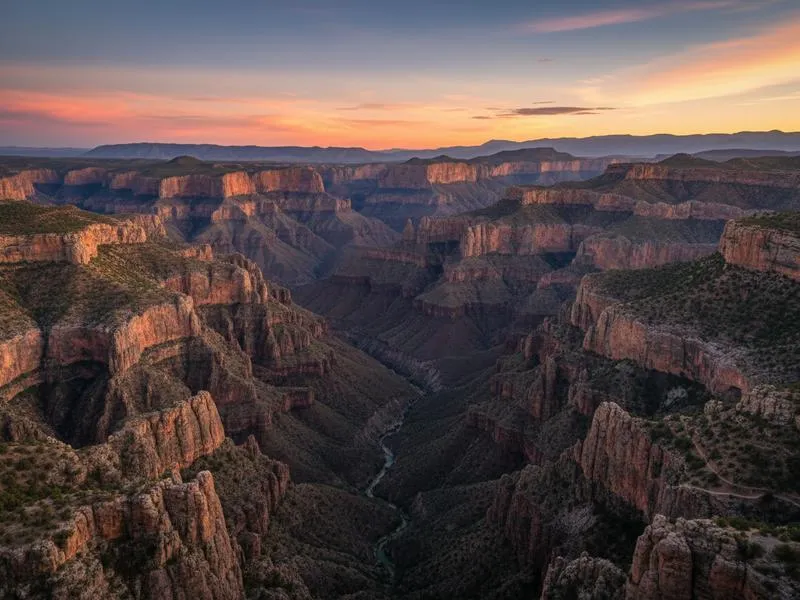 Boat tour through Sumidero Canyon in Chiapas with towering 1,000-meter canyon walls rising on both sides of the boat under blue sky
