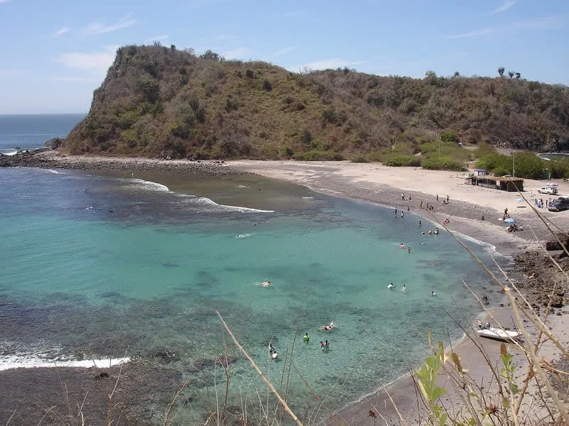 Tenacatita Bay near Barra de Navidad — remote Pacific beach and mangrove estuary 25 km north, accessed by dirt road