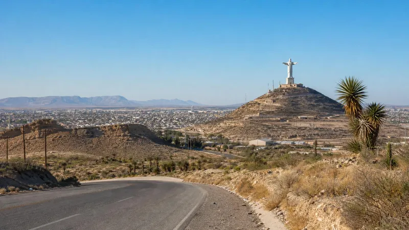 Dry February view over Torreon with Cristo de las Noas and desert roads