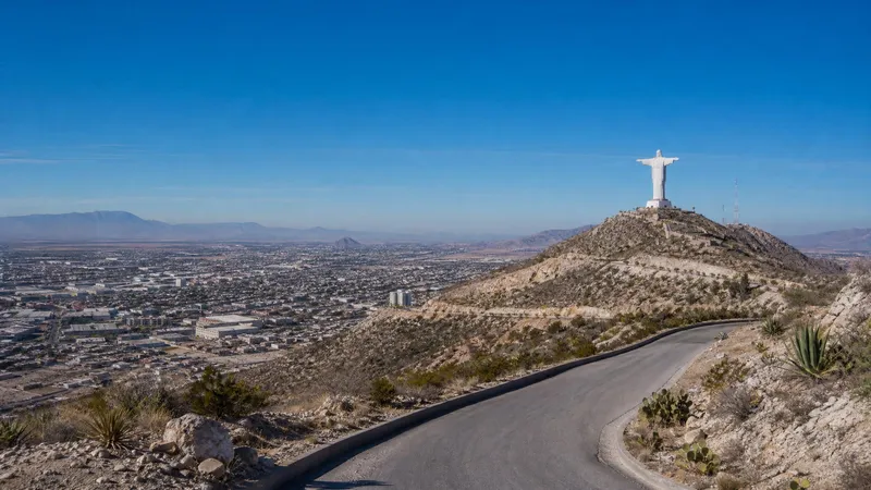 Dry January view over Torreon with Cristo de las Noas and desert roads