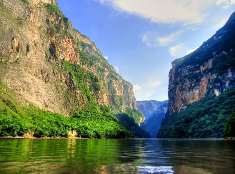 Steep limestone walls rising above the Grijalva River in Sumidero Canyon