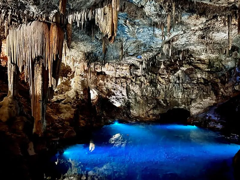 Remote cave cenote near Valladolid Yucatan with stalactites and clear water