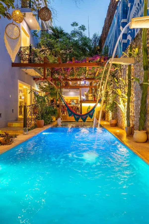 Boutique hotel room and courtyard in Valladolid, Yucatán