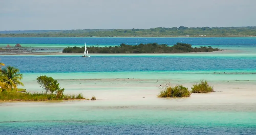 Seven Colors Lagoon in Bacalar under bright sun