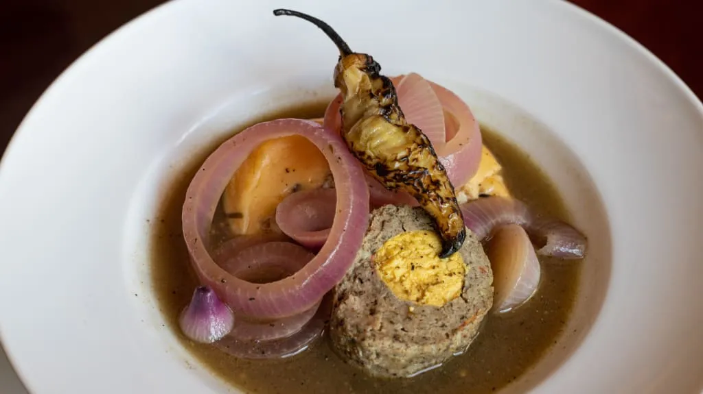 Escabeche oriental — Yucatan chicken cooked in vinegar-spice sauce with xcatic chile and black pepper from Valladolid