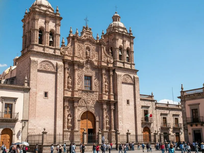 Zacatecas cathedral pink cantera stone at sunset with ornate Churrigueresque facade