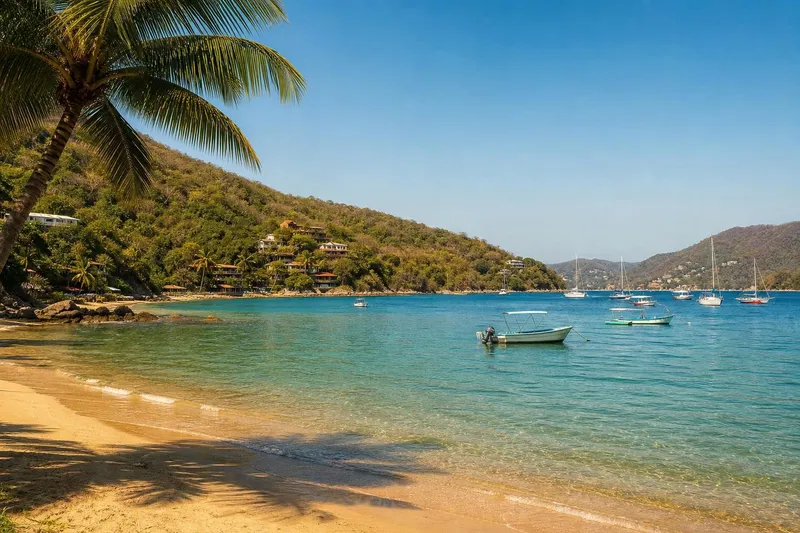 Calm blue water and anchored boats in Zihuatanejo Bay