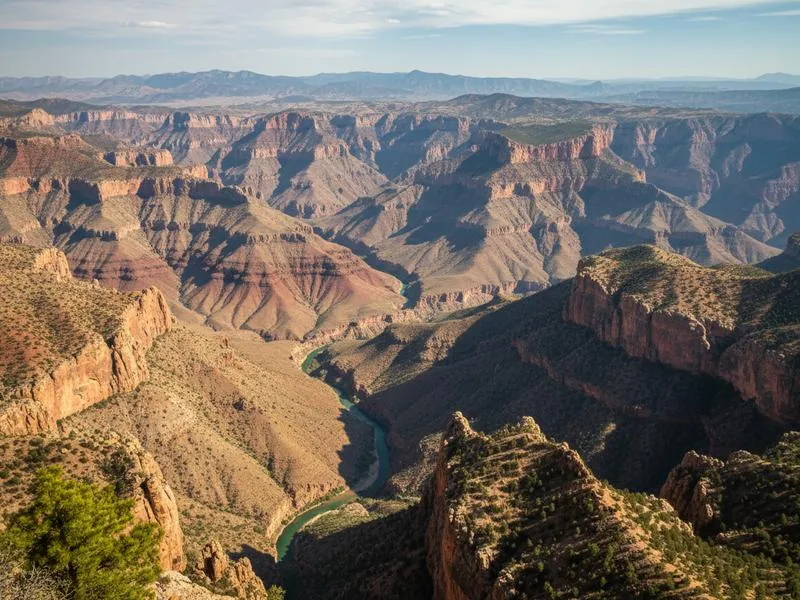 Woman in Zinacantan demonstrating traditional backstrap loom weaving — creating intricate textiles with symbolic patterns unique to the Tzotzil Maya community