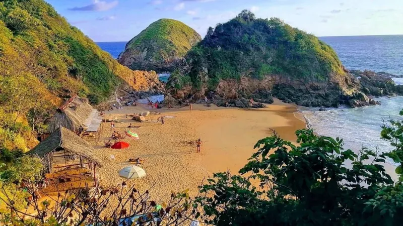 Zipolite beach in Oaxaca, Mexico's most famous nude beach with soft sand and Pacific waves