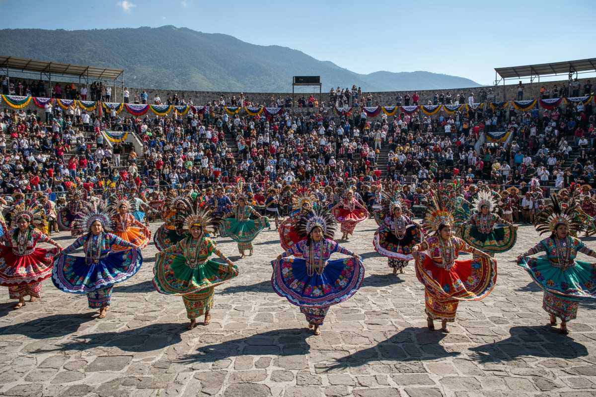 Guelaguetza dancers in traditional Oaxacan costumes at the Oaxaca City amphitheater