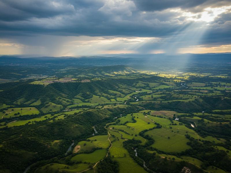 Oaxaca Valley viewed from Monte Albán during the green season with lush vegetation and dramatic clouds