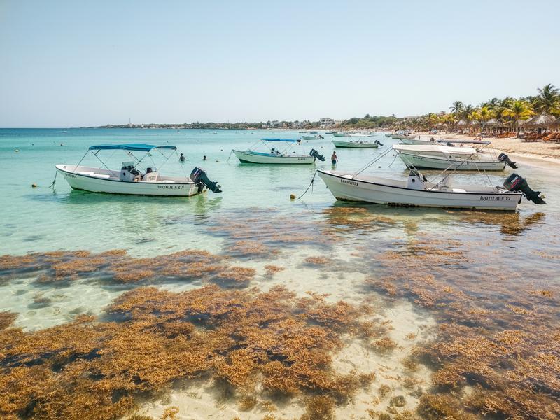 Shallow water at Playa Norte Isla Mujeres with anchored boats