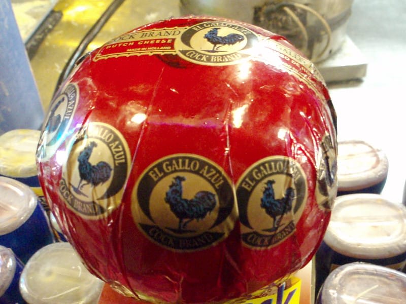 Red wax-coated Edam cheese ball used for Yucatán marquesitas
