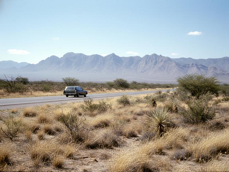 Open high-desert highway outside Matehuala under clear May sun