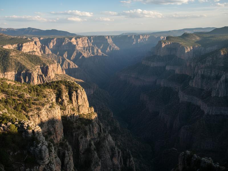 dramatic panoramic view of copper canyon barrancas del cobre with deep gorges and layered rock formations