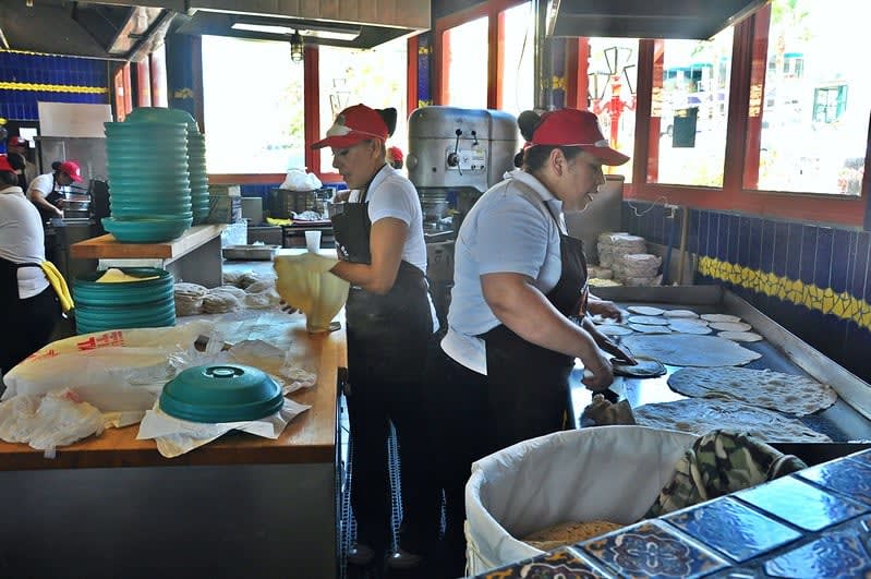 Fresh flour tortillas being prepared for a Puerto Nuevo lobster meal