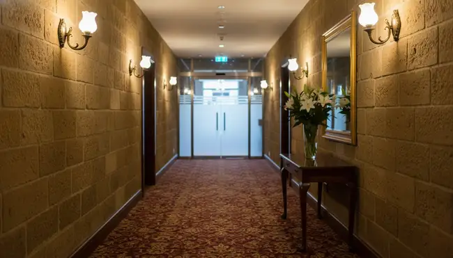 Traditional stone hallway decor with warm lighting