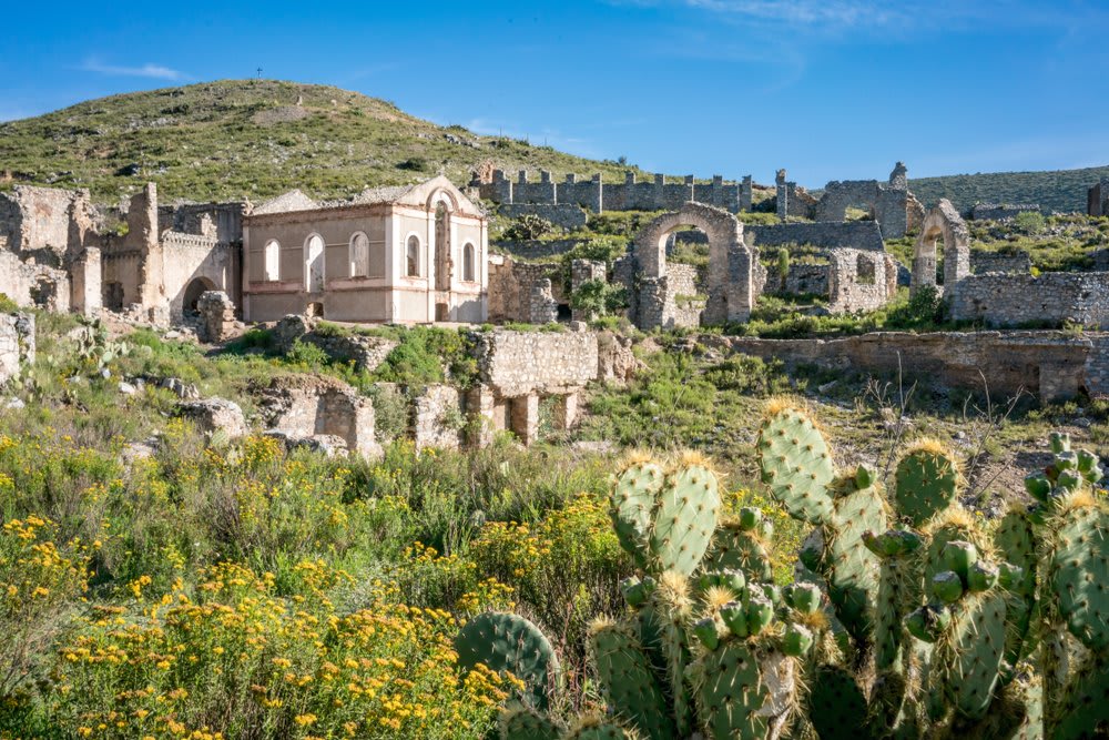 Stone architecture of Real de Catorce — typical colonial building facades along the cobblestone streets of the former silver city