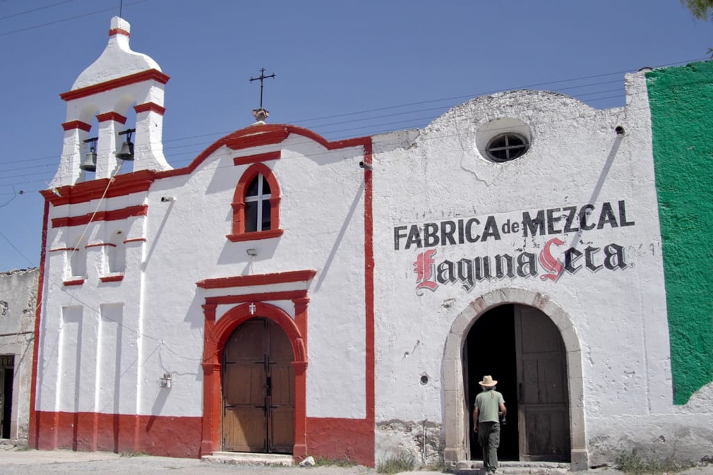 Abandoned hacienda ruins at Real de Catorce — crumbling stone walls of a colonial silver mining estate