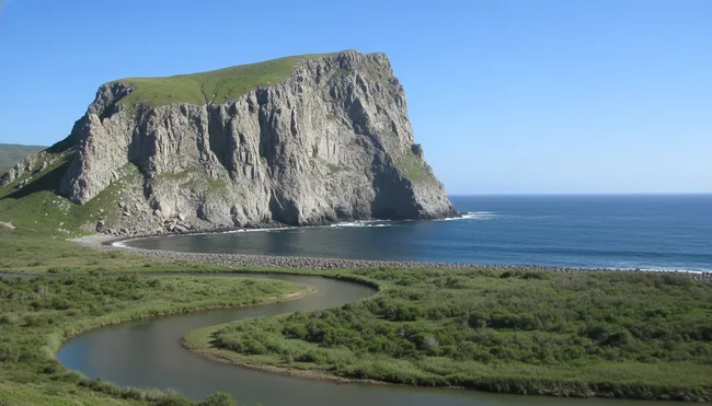 Scenic view of Roca Partida basalt cliffs rising from the ocean