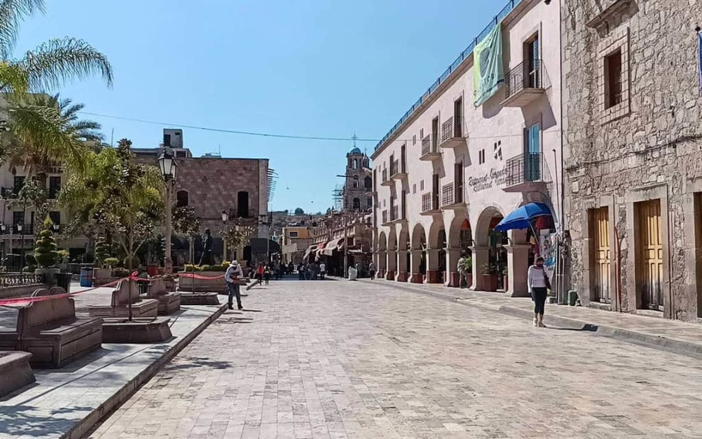 San Juan de los Lagos downtown — the colonial plaza and basilica facade in the Jalisco Pueblo Mágico pilgrimage city