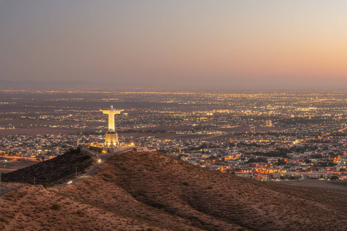 Dry desert view over Torreon with Cristo de las Noas and northern Mexico roads nearby