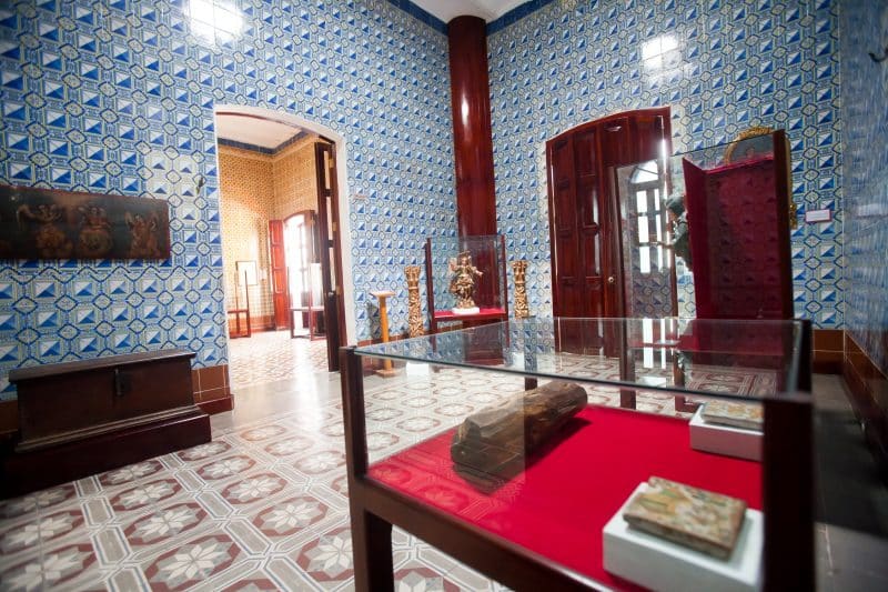 Detail of Casa de los Azulejos facade showing Catalan ceramic tile patterns on 19th-century mansion in Villahermosa's historic center