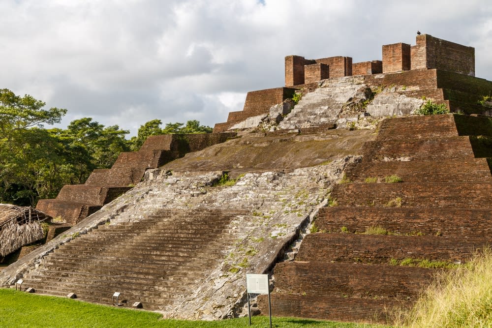 Stucco Maya friezes preserved at Comalcalco archaeological site showing gods and rulers from the Classic period