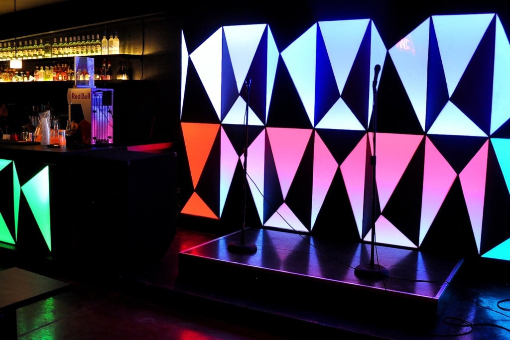 Nightlife street in Villahermosa Tabasco with illuminated bars and restaurants along Paseo Tabasco boulevard