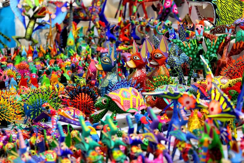 Alebrijes from San Martín Tilcajete, Oaxaca — hand-carved copal wood animal figures painted with bright acrylic colors